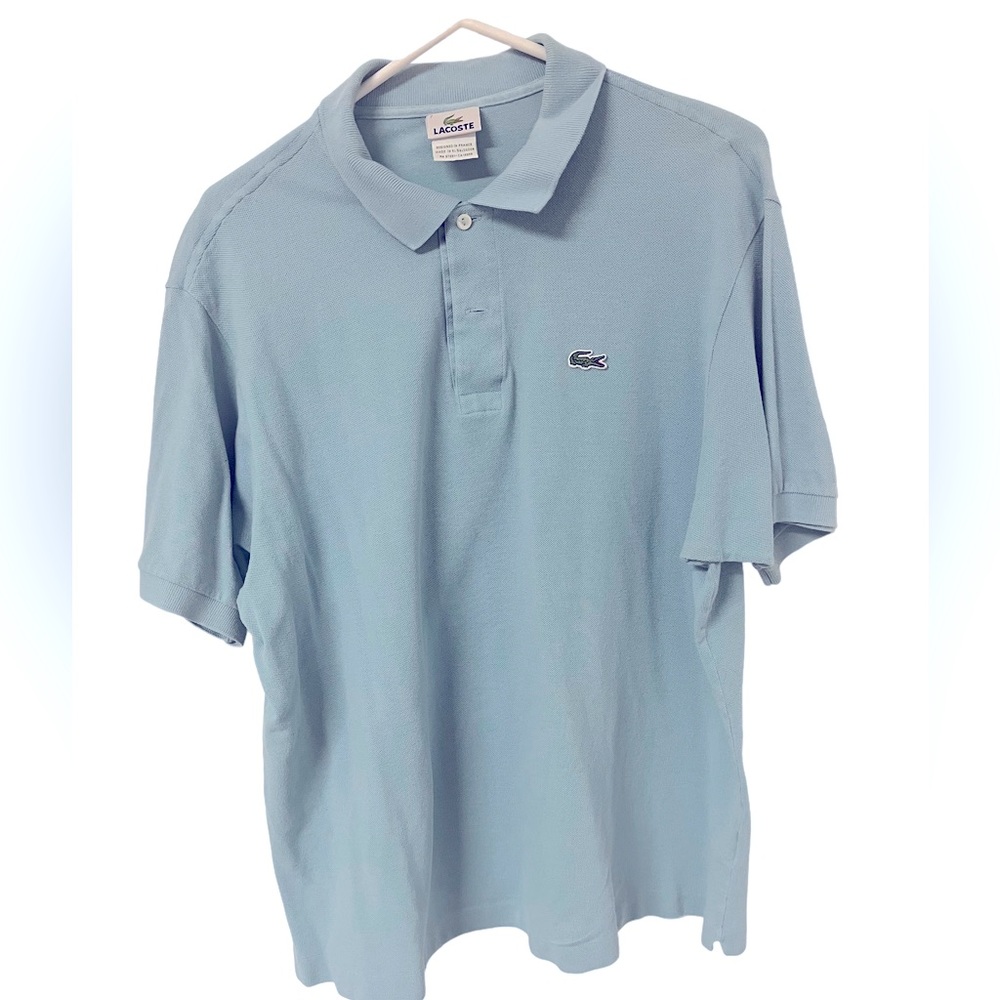 Lacoste Men’s polo 2 button .No sizer pit to pit is 16”. Medium.